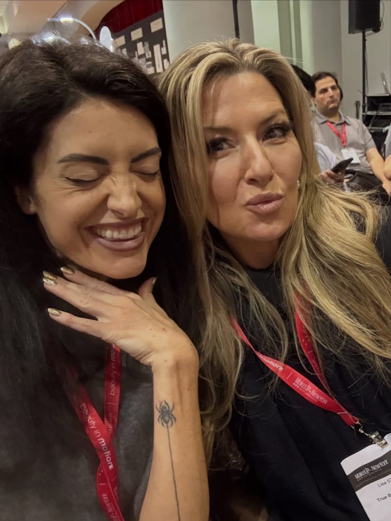 Braelinn Frank and a friend taking a selfie at the event