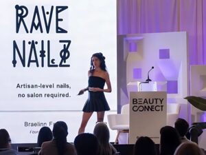 Braelinn Frank speaking at Beauty Connect LA with Rave Nailz